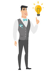 Image showing Groom pointing at business idea light bulb.