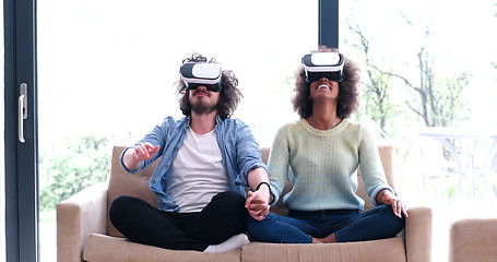 Image showing Multiethnic Couple using virtual reality headset