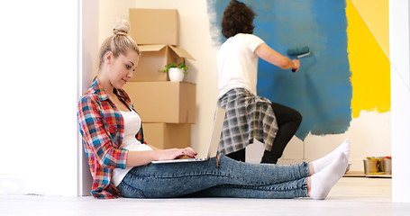 Image showing Happy couple doing home renovations