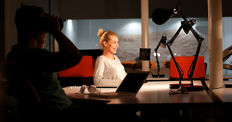 Image showing young designers in the night office