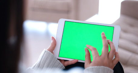 Image showing woman on sofa using tablet computer