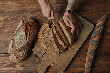 Image showing Sliced bread on a board