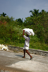 Image showing Baggage handler - toil of Indian coolie worker