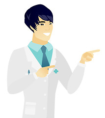 Image showing Young asian doctor pointing to the side.