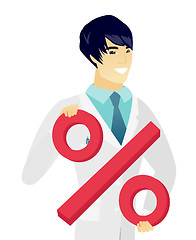 Image showing Young asian doctor holding percent sign.