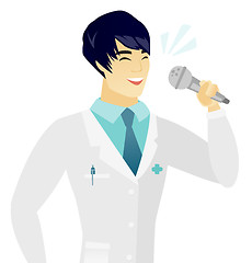 Image showing Young asian doctor singing to the microphone.