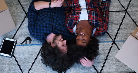 Image showing Top view of attractive young multiethnic couple