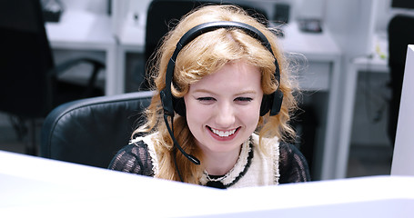 Image showing female call centre operator doing her job