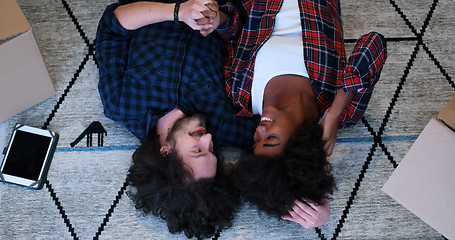 Image showing Top view of attractive young multiethnic couple