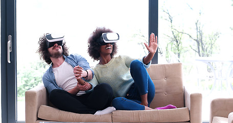 Image showing Multiethnic Couple using virtual reality headset