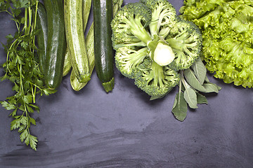 Image showing Variety of green vegetables and herbs. Clean eating food concept