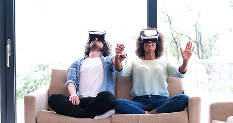 Image showing Multiethnic Couple using virtual reality headset