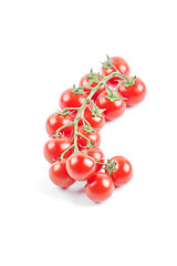 Image showing Fresh organic cherry tomatoes bunch isolated on white.