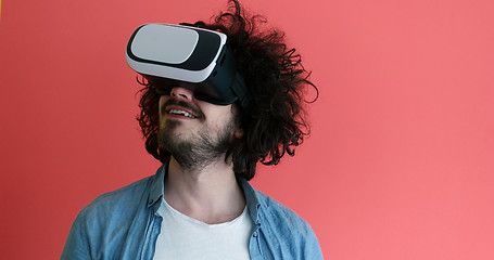 Image showing young man using VR headset glasses of virtual reality