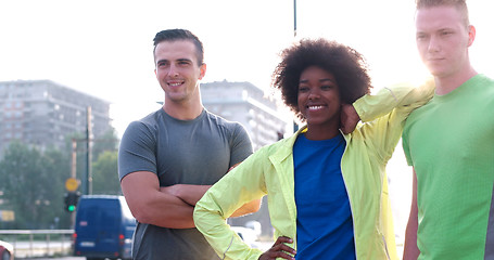 Image showing Portrait of multiethnic group of young people on the jogging