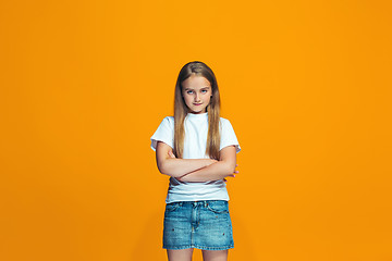 Image showing Young serious thoughtful teen girl. Doubt concept.