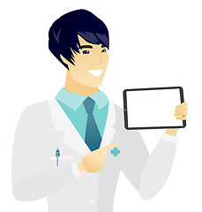 Image showing Young asian doctor holding tablet computer.