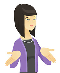 Image showing Confused asian business woman shrugging shoulders.