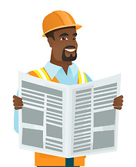 Image showing African-american builder reading newspaper.