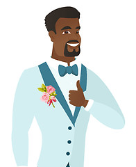 Image showing Young african-american groom giving thumb up.