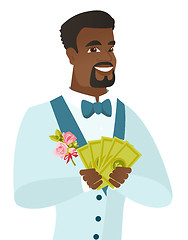 Image showing Young african-american groom holding money.