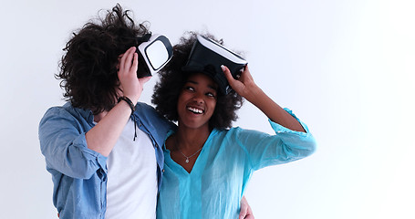 Image showing multiethnic couple getting experience using VR headset glasses