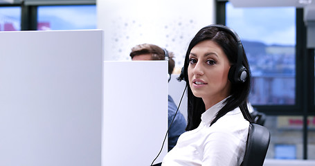 Image showing female call centre operator doing her job