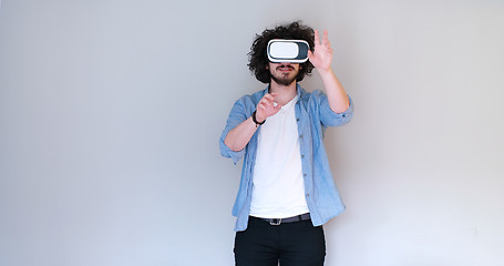 Image showing Man using headset of virtual reality