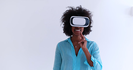 Image showing black girl using VR headset glasses of virtual reality