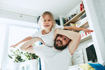 Image showing Father and his six years kid girl at home