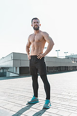 Image showing Fit fitness man posing at city