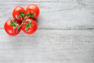 Image showing Top view of bunch of fresh tomatoes