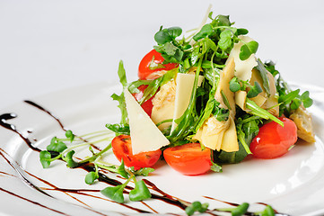 Image showing salad with artichoke on the white plate