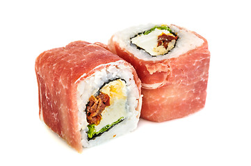 Image showing Uramaki maki sushi with procsiutto, two rolls isolated on white