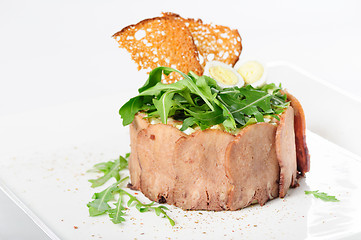 Image showing tasty appetizer with sliced veal tongue and riuccola