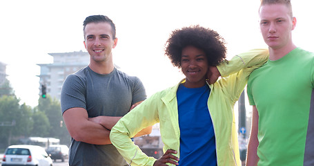 Image showing Portrait of multiethnic group of young people on the jogging