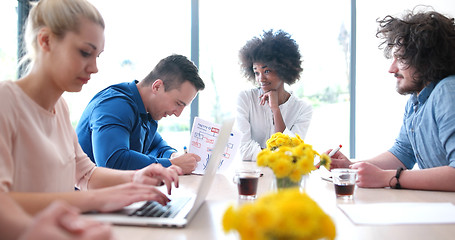 Image showing Multiethnic startup business team on meeting