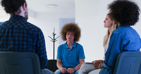 Image showing Multiethnic startup Business Team At A Meeting at modern office 