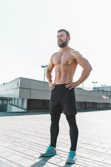 Image showing Fit fitness man posing at city