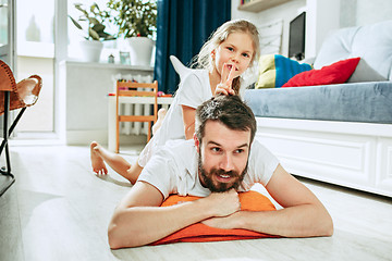 Image showing Father and his six years kid girl at home