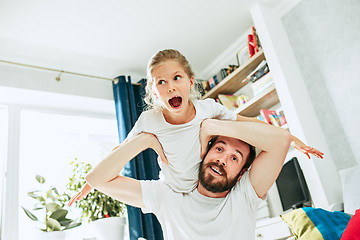 Image showing Father and his six years kid girl at home