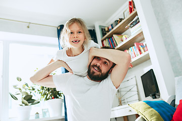 Image showing Father and his six years kid girl at home