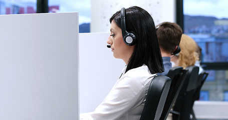 Image showing female call centre operator doing her job