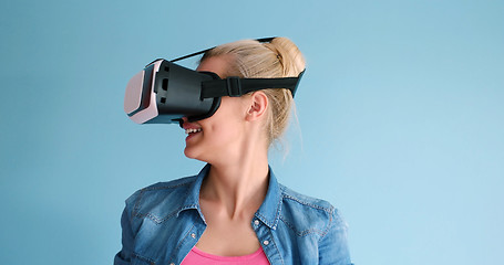 Image showing woman using VR headset glasses of virtual reality