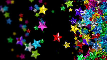 Image showing Colourful glass stars on the dark background