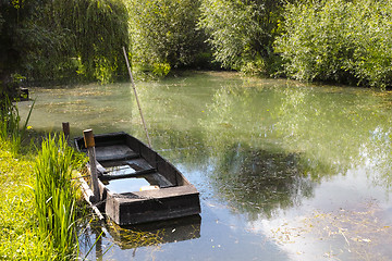 Image showing Small boat in marshes in Bourges