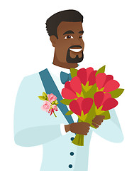 Image showing Young african-american groom with bridal bouquet.