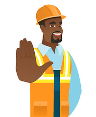 Image showing African-american builder showing palm hand.