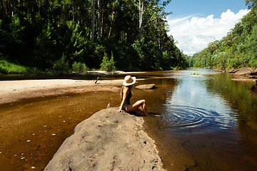 Image showing Woman relaxing along the shallows of the Grose River