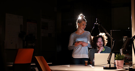 Image showing young designers in the night office